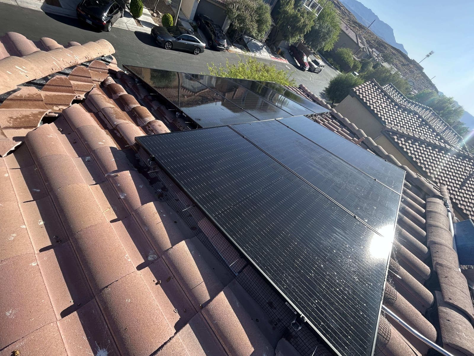 Detail of clean solar panels on a tile roof